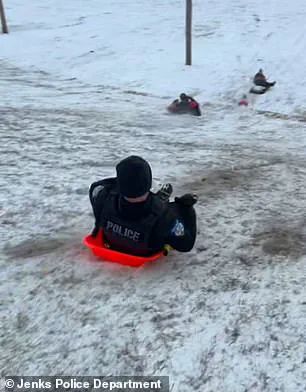 Viral Footage Shows Oklahoma Police Officer Accidentally Sledding Into Child During Snow Day
