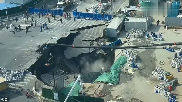 Shanghai Sinkhole Swallows Road, Workers Scramble as Metro Construction Suspected