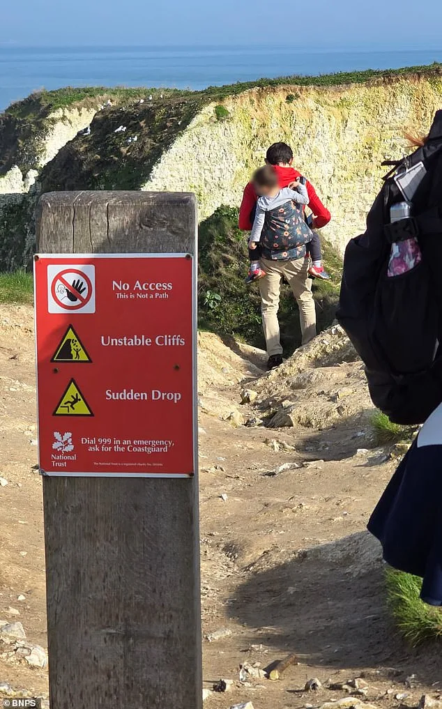 Ignoring 'No Access' Sign, Father Brings Child to Hazardous Cliff Edge