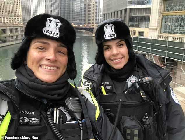 Body cam video shows Chicago officer shooting his partner during high-speed pursuit.