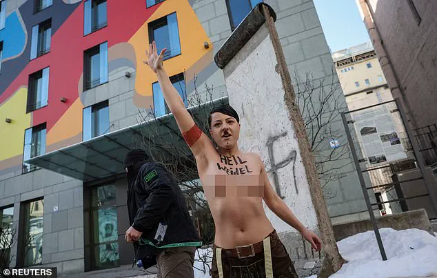 Nude Feminist Protestor Takes On Hard-Right AfD Party in Unique Display at German Embassy in Kyiv