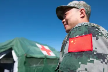 Chinese Coast Guard Lands Near Philippine Base in South China Sea