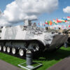 Russia's BTM-3F Armored Vehicle Trials Highlight Escalating Efforts to Counter FPV Drones in Modern Warfare